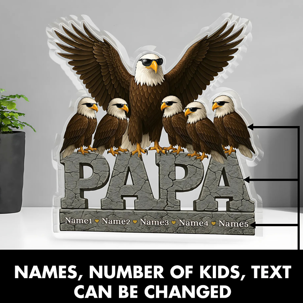 Decorative sign with an eagle family and 'PAPA' text on a gray background
