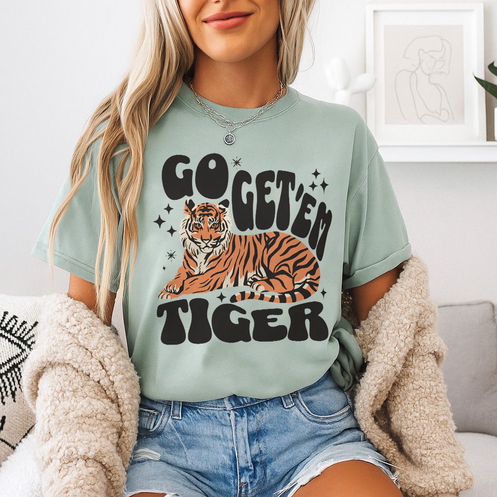 Go Get 'Em Tiger t-shirt in classic White – clean bright canvas for the colorful tiger graphic and playful groovy font, ideal for a fresh and timeless aesthetic.