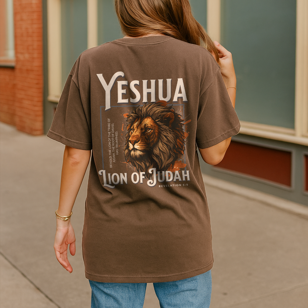 Woman in espresso brown Christian shirt with Lion of Judah illustration and Revelation 5:5 verse