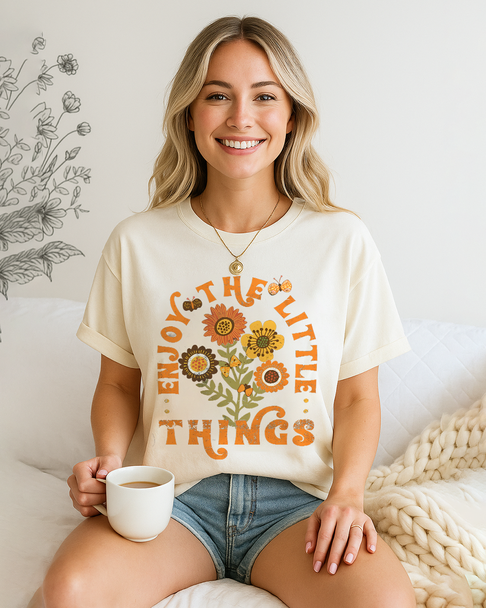 Ivory Comfort Colors 1717 shirt with positive “Enjoy The Little Things” message and floral artwork