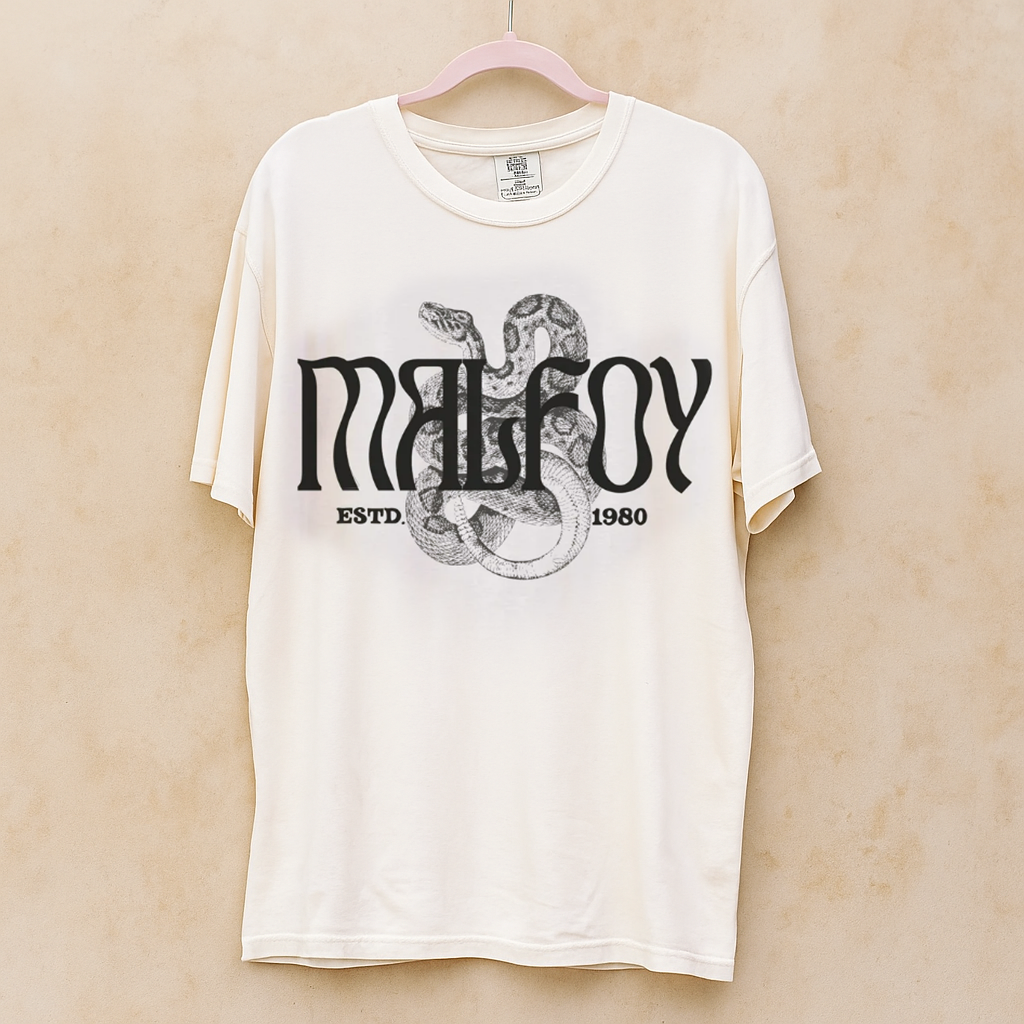 Malfoy shirt in ivory hanging on pink hanger against beige wall