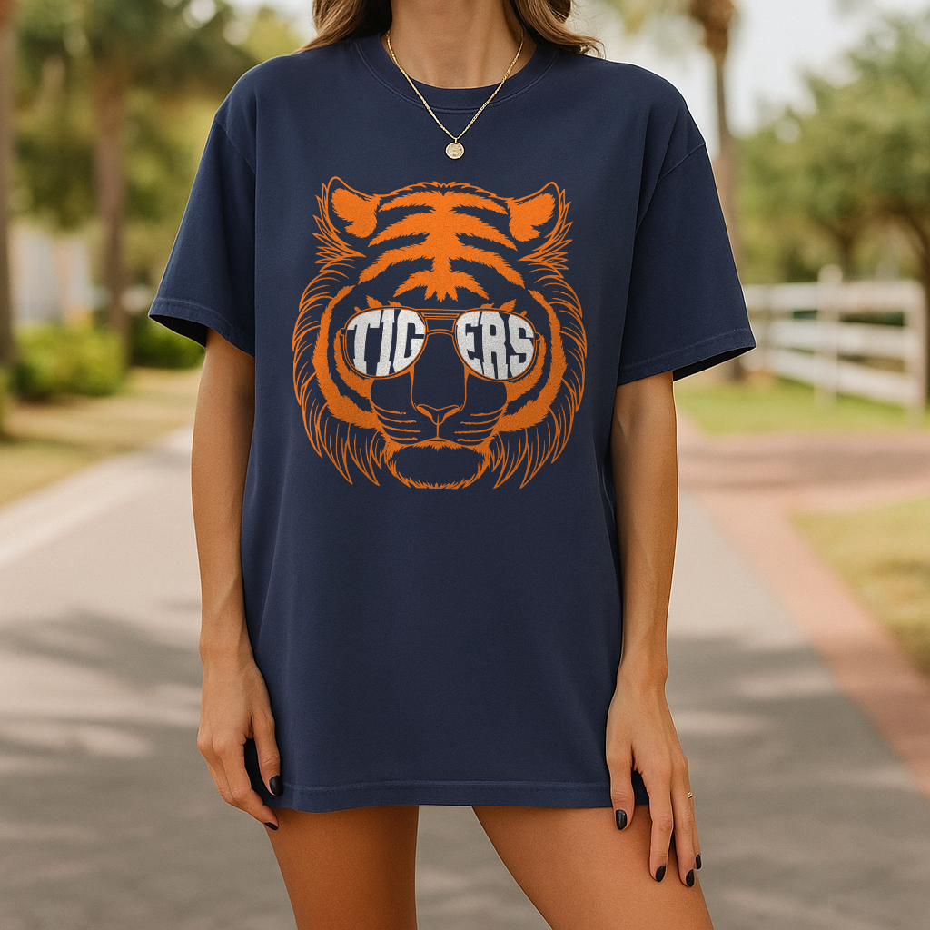 Midnight blue retro t-shirt featuring orange tiger graphic for Tigers baseball fans.