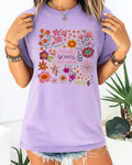  Vibrant lavender tee styled with floral design and uplifting quote; cheerful aesthetic perfect for healing days.