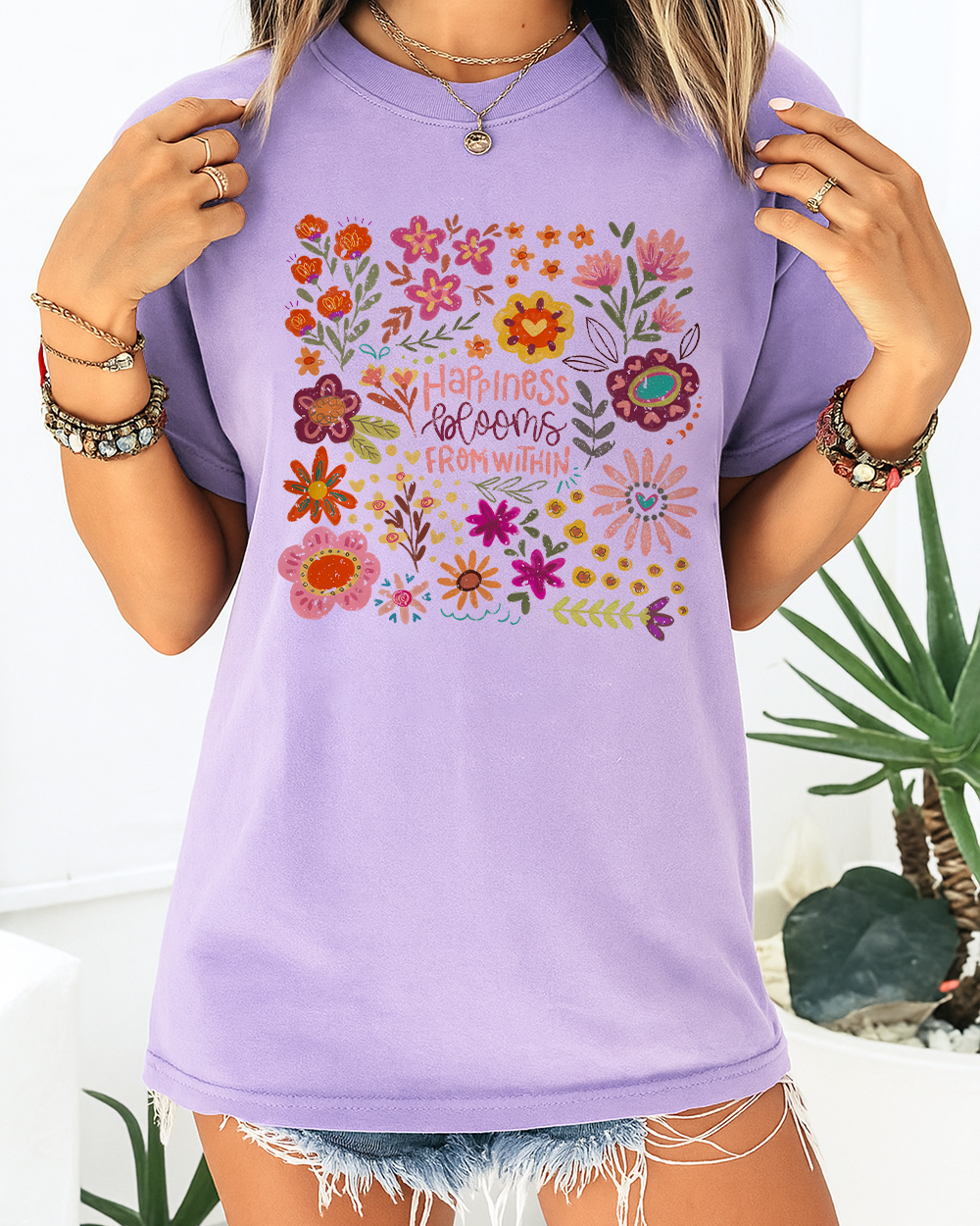  Vibrant lavender tee styled with floral design and uplifting quote; cheerful aesthetic perfect for healing days.