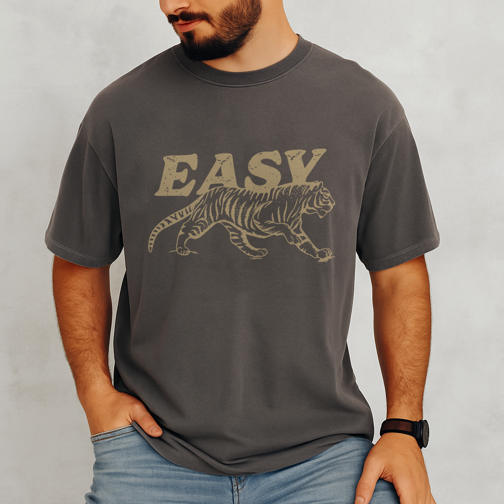 Man in faded gray Comfort Colors shirt featuring walking tiger and EASY graphic