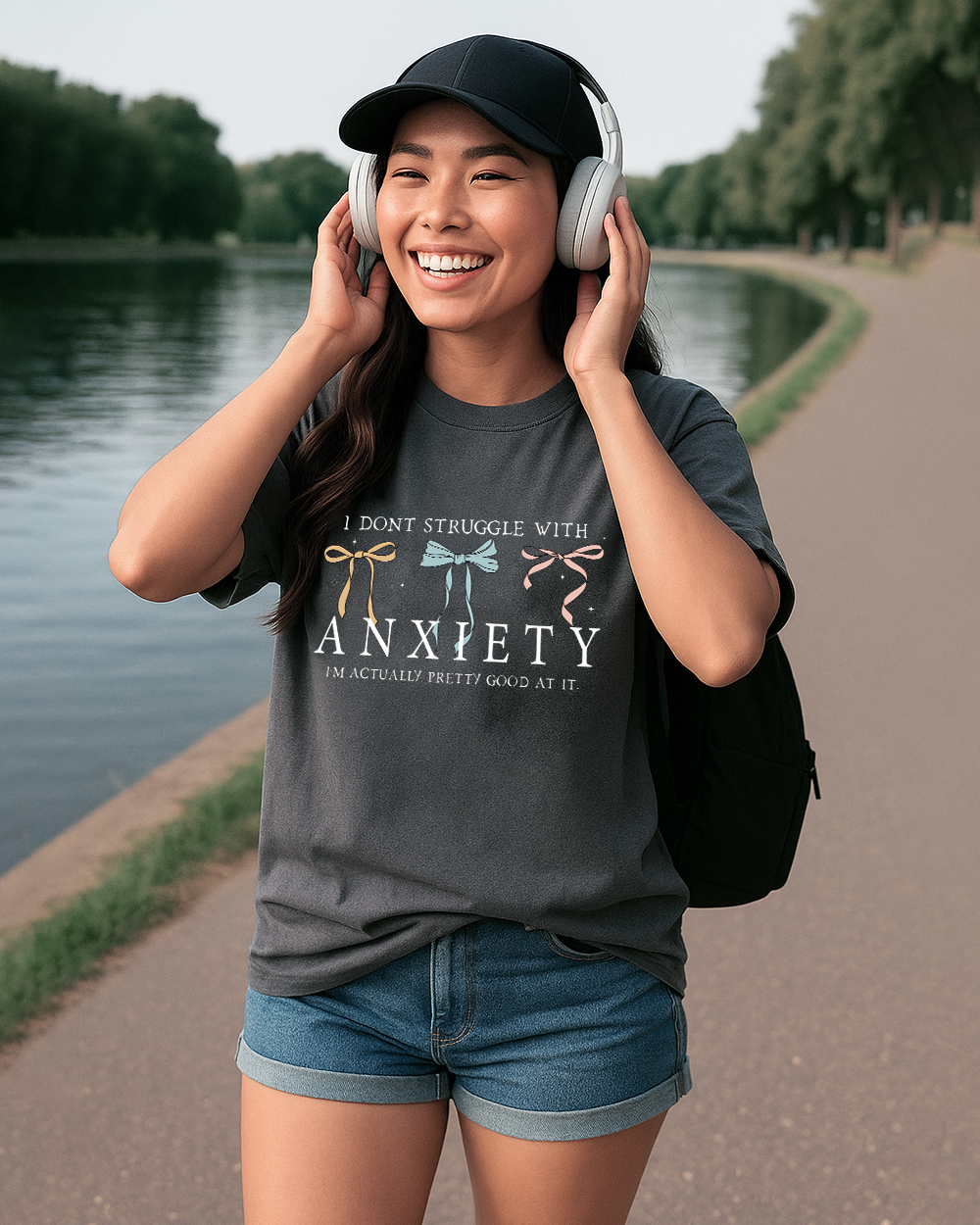 Pepper Comfort Colors 1717 shirt with bold “Pretty Good at Anxiety” quote and vintage bow design