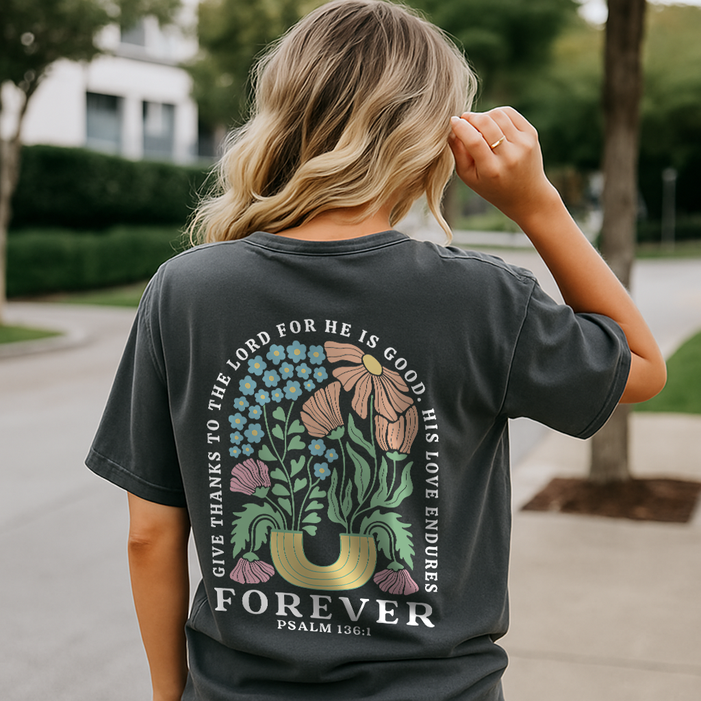 Christian Comfort Colors shirt with Psalm 136:1 verse and retro floral back print