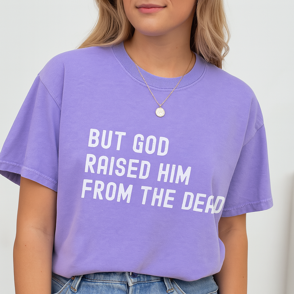 Violet shirt with "But God Raised Him From The Dead" Bible verse print
