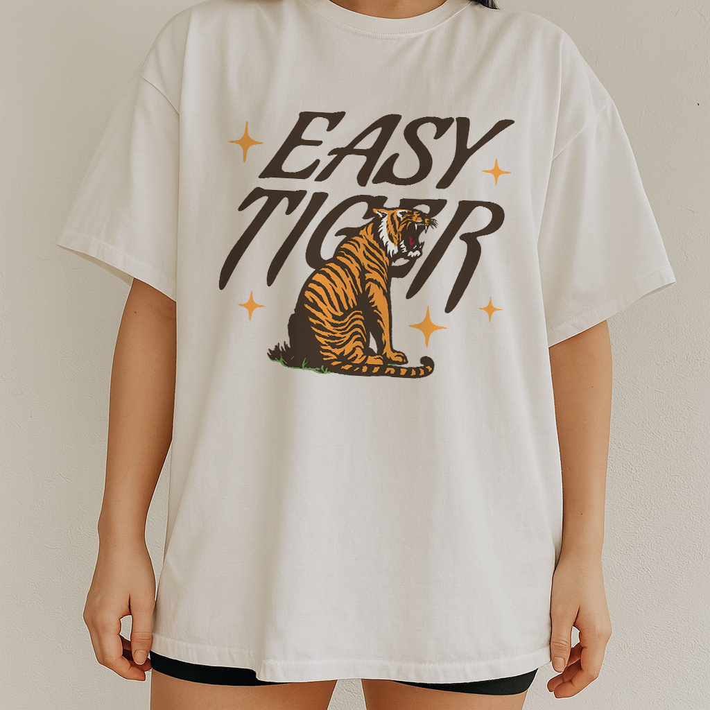 Close-up of Easy Tiger design on white Comfort Colors 1717 t-shirt – bold graphic print with cozy unisex fit