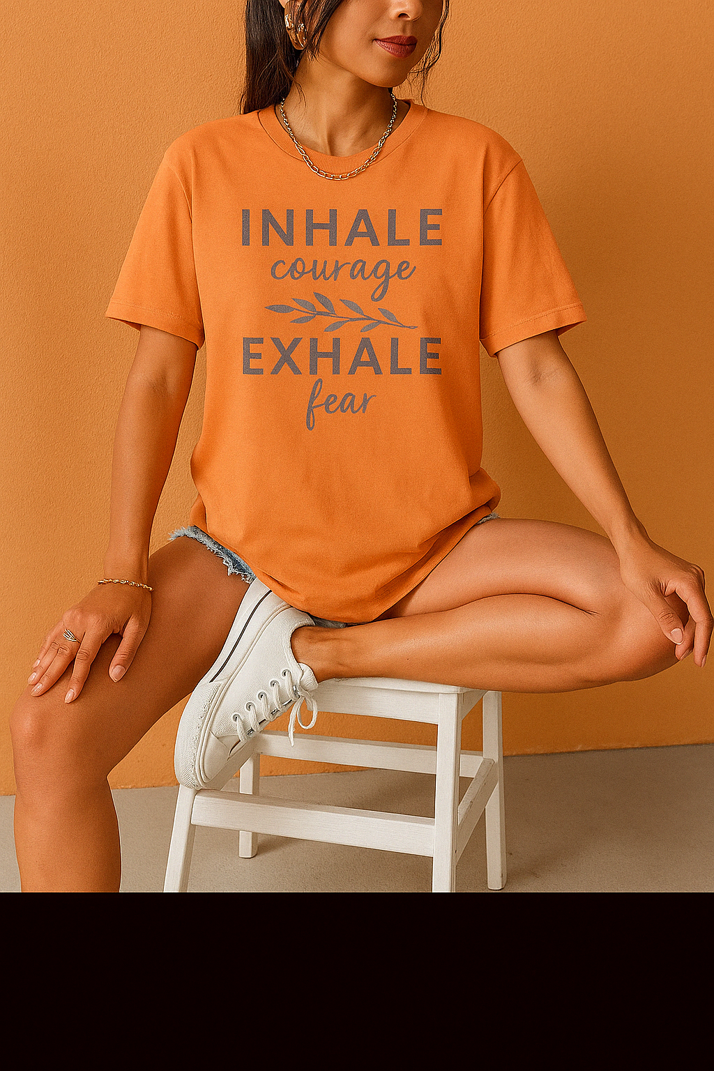 Yam Comfort Colors shirt with healing affirmation and leaf graphic. Worn in vibrant setting, soft light for bold mood.